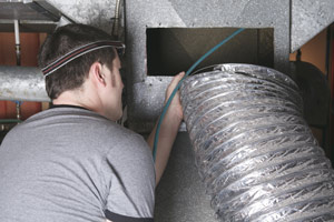 Worker Installing Heating